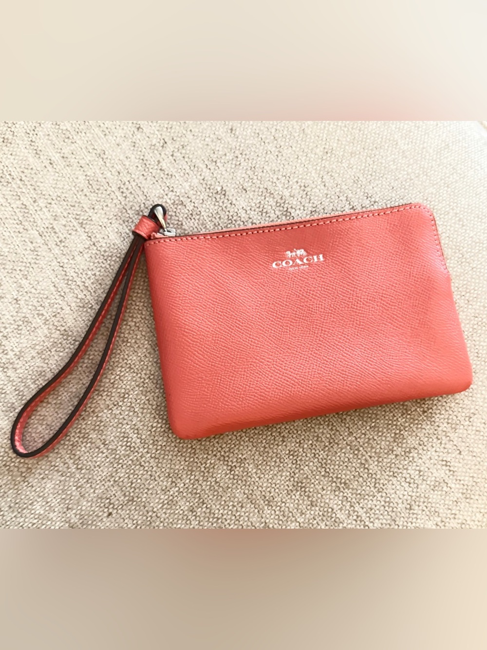 NWOT **COACH** Coral Wristlet with Strap
